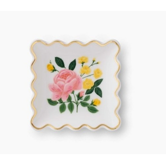 Decorative plate with floral design on a white background