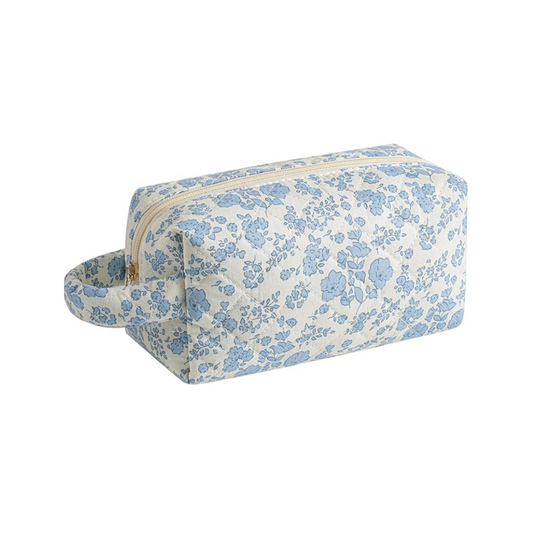 Floral-patterned toiletry bag on a white background