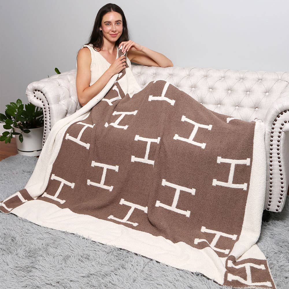 ‘H’ Monogram Patterned Reversible Throw Blanket