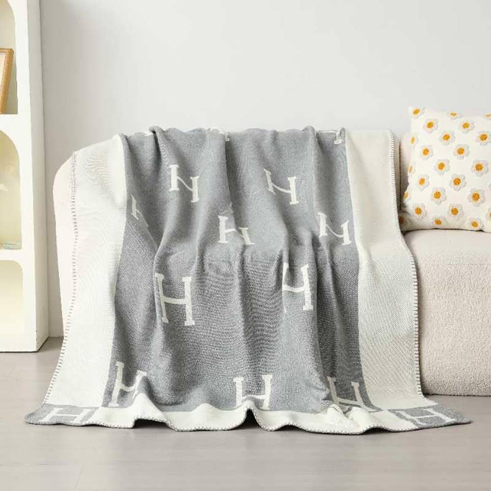 Monogram Pattern Reversible Throw Blanket: Gray