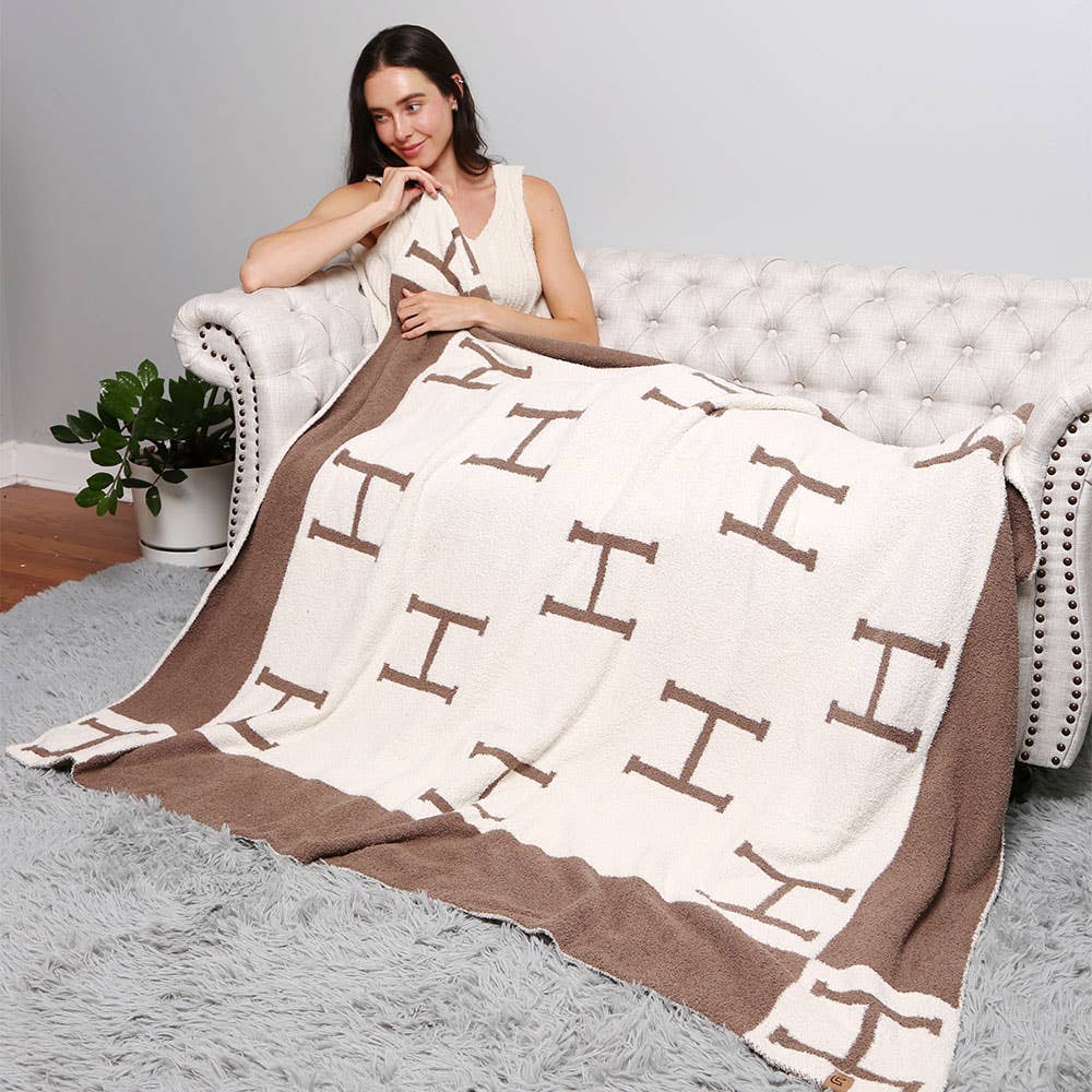 ‘H’ Monogram Patterned Reversible Throw Blanket